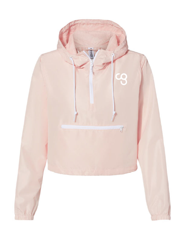 A blush-colored, cropped windbreaker jacket with a hood, quarter zipper front, and horizontal zipper pocket. CG logo printed on chest in white.